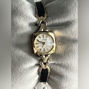 Longines mini mechanical ladies watch gold filled 10K.